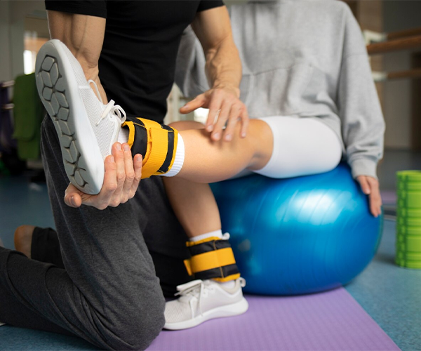 Caregiver accompanying elderly person to medical appointment