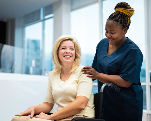 Caring healthcare professional with elderly client